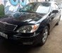 Toyota Camry 2002 - Bán ô tô Toyota Camry năm sản xuất 2002, màu đen, 300 triệu