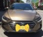 Hyundai Elantra 1.6 MT 2016 - Bán xe Hyundai Elantra 1.6 MT năm sản xuất 2016, màu vàng 