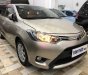 Toyota Vios E 2015 - Cần bán xe Toyota Vios E sản xuất năm 2015, màu vàng số sàn