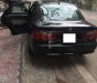 Mazda 1200 XL 1999 - Cần bán lại xe Mazda 1200 XL 2000, màu đen xe gia đình