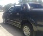 Toyota Hilux 2012 - Cần bán lại xe Toyota Hilux đời 2012, màu đen