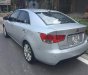 Kia Forte SLi 1.6 AT 2009 - Cần bán Kia Forte SLi 1.6 AT năm sản xuất 2009, màu bạc 