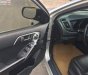 Kia Forte SLi 1.6 AT 2009 - Cần bán Kia Forte SLi 1.6 AT năm sản xuất 2009, màu bạc 