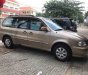 Kia Carnival 2009 - Cần bán Kia Carnival 2009, màu nâu số tự động, 245tr