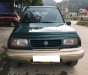 Suzuki Vitara G 2005 - Gia đình cần bán Vitara 2005, số sàn, màu xanh, hai cầu