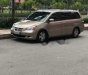 Honda Odyssey   2010 - Bán xe Honda Odyssey đời 2010, màu vàng, xe nhập