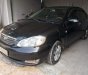 Toyota Corolla 2003 - Bán Toyota Corolla sản xuất năm 2003, màu đen xe gia đình, giá 186tr