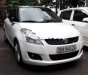 Suzuki Swift 1.4 AT 2015 - Bán xe Suzuki Swift 1.4 AT đời 2015, màu trắng số tự động, giá tốt