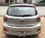 Hyundai i10 1.0MT Base 2014 - Cần bán gấp Hyundai i10 1.0MT Base 2014, màu bạc chính chủ