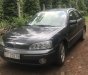 Ford Laser   Ghia  2002 - Cần bán lại xe Ford Laser Ghia đời 2002, màu xám, giá tốt