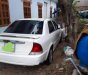 Ford Laser  1.6MT 2001 - Cần bán gấp Ford Laser 1.6MT năm 2001, màu trắng