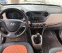 Hyundai i10 1.0MT Base 2014 - Cần bán gấp Hyundai i10 1.0MT Base 2014, màu bạc chính chủ