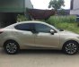 Mazda 2 2016 - Cần bán lại xe Mazda 2 2016, màu vàng số tự động