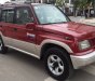 Suzuki Vitara 2005 - Gia đình cần bán Vitara 2005, số sàn, hai cầu, màu đỏ