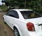 Daewoo Lacetti SE   2004 - Bán ô tô Daewoo Lacetti SE đời 2004, màu trắng, 5 mâm đúc