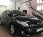 Toyota Corolla altis MT  2009 - Bán ô tô Toyota Corolla altis MT năm sản xuất 2009, màu đen đã đi 80.200km, 410 triệu