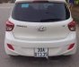 Hyundai Grand i10  1.2MT 2015 - Bán ô tô Hyundai Grand i10 1.2MT năm 2015, màu trắng, xe chính chủ đi giữ gìn