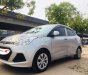 Hyundai Grand i10  1.2MT 2015 - Bán ô tô Hyundai Grand i10 1.2MT đời 2015, màu bạc