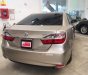 Toyota Camry   2.0E  2016 - Bán ô tô Toyota Camry 2.0E 2016, màu vàng, xe nhập