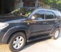 Toyota Fortuner 2011 - Cần bán gấp Toyota Fortuner sản xuất 2011, màu xám xe gia đình