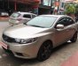 Kia Forte 1.6MT 2010 - Cần bán Kia Forte 1.6MT đời 2010, màu kem (be), giá tốt