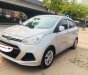 Hyundai Grand i10  1.2MT 2015 - Bán ô tô Hyundai Grand i10 1.2MT đời 2015, màu bạc