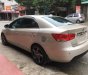 Kia Forte 1.6MT 2010 - Cần bán Kia Forte 1.6MT đời 2010, màu kem (be), giá tốt