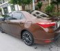 Toyota Corolla altis 2015 - Bán xe Toyota Corolla altis sản xuất năm 2015, màu nâu như mới