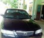 Mazda 626 2002 - Cần bán gấp Mazda 626 đời 2002, màu đen