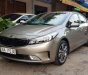 Kia Cerato 1.6MT 2018 - Bán xe Kia Cerato 1.6 MT SX 2018, màu vàng cát