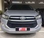 Toyota Innova  2.0E   2016 - Bán ô tô Toyota Innova 2.0E đời 2016, màu bạc số sàn