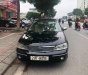 Ford Laser GHIA 1.8 AT 2003 - Cần bán Ford Laser GHIA 1.8 AT đời 2003, màu đen số tự động