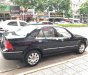 Ford Laser GHIA 1.8 AT 2003 - Cần bán Ford Laser GHIA 1.8 AT đời 2003, màu đen số tự động