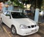 Daewoo Lacetti 2004 - Cần bán gấp Daewoo Lacetti năm sản xuất 2004, màu trắng chính chủ