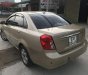 Daewoo Lacetti 1.8 Max 2004 - Gia đình Daewoo Lacetti 1.8 Max đời 2004, màu vàng cát