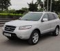 Hyundai Santa Fe  2.0AT 2WD MLX  2009 - Cần bán lại xe Hyundai Santa Fe đăng ký 2009, màu bạc nhập khẩu nguyên chiếc bản MLX, giá tốt 570 triệu