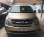 Hyundai Grand Starex 2.5 MT 2012 - Cần bán lại xe Hyundai Grand Starex 2.5 MT năm sản xuất 2012, màu vàng, xe nhập  