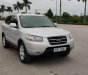 Hyundai Santa Fe  2.0AT 2WD MLX  2009 - Cần bán lại xe Hyundai Santa Fe đăng ký 2009, màu bạc nhập khẩu nguyên chiếc bản MLX, giá tốt 570 triệu