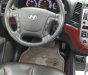 Hyundai Santa Fe   2.0 AT  2009 - Bán Hyundai Santa Fe 2.0 AT 2009, màu bạc chính chủ, 570tr