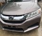 Honda City 1.5 MT 2015 - Cần bán gấp Honda City 1.5 MT đời 2015, màu nâu 