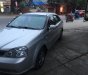 Daewoo Lacetti ex 2004 - Cần bán Daewoo Lacetti ex năm 2004, màu bạc 