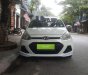 Hyundai Grand i10   2014 - Bán Hyundai Grand i10 sản xuất 2014, màu trắng, 255tr