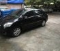 Toyota Vios 1.5E 2011 - Bán Toyota Vios 1.5E sản xuất năm 2011, màu đen chính chủ 