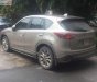 Mazda CX 5 2014 - Cần bán gấp Mazda CX 5 năm 2014, màu vàng như mới 