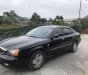 Daewoo Magnus 2004 - Bán xe Daewoo Magnus đời 2004, màu đen