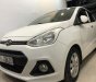 Hyundai Grand i10 2016 - Cần bán gấp Hyundai Grand i10 sản xuất năm 2016, màu trắng chính chủ