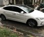 Hyundai Elantra GLS 1.6AT 2017 - Cần bán lại xe Hyundai Elantra GLS 1.6AT sản xuất 2017, màu trắng xe gia đình