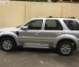 Ford Escape XLS 2.3L 4x2 AT 2011 - Bán Ford Escape XLS 2.3L 4x2 AT sản xuất năm 2011, màu bạc 