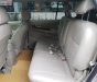 Toyota Innova E 2015 - Cần bán lại xe Toyota Innova E 2015, màu bạc số sàn