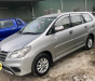 Toyota Innova 2.0E 2014 - Bán Toyota Innova năm 2014 màu bạc, giá tốt 595tr hỗ trợ 100% phí trước bạ